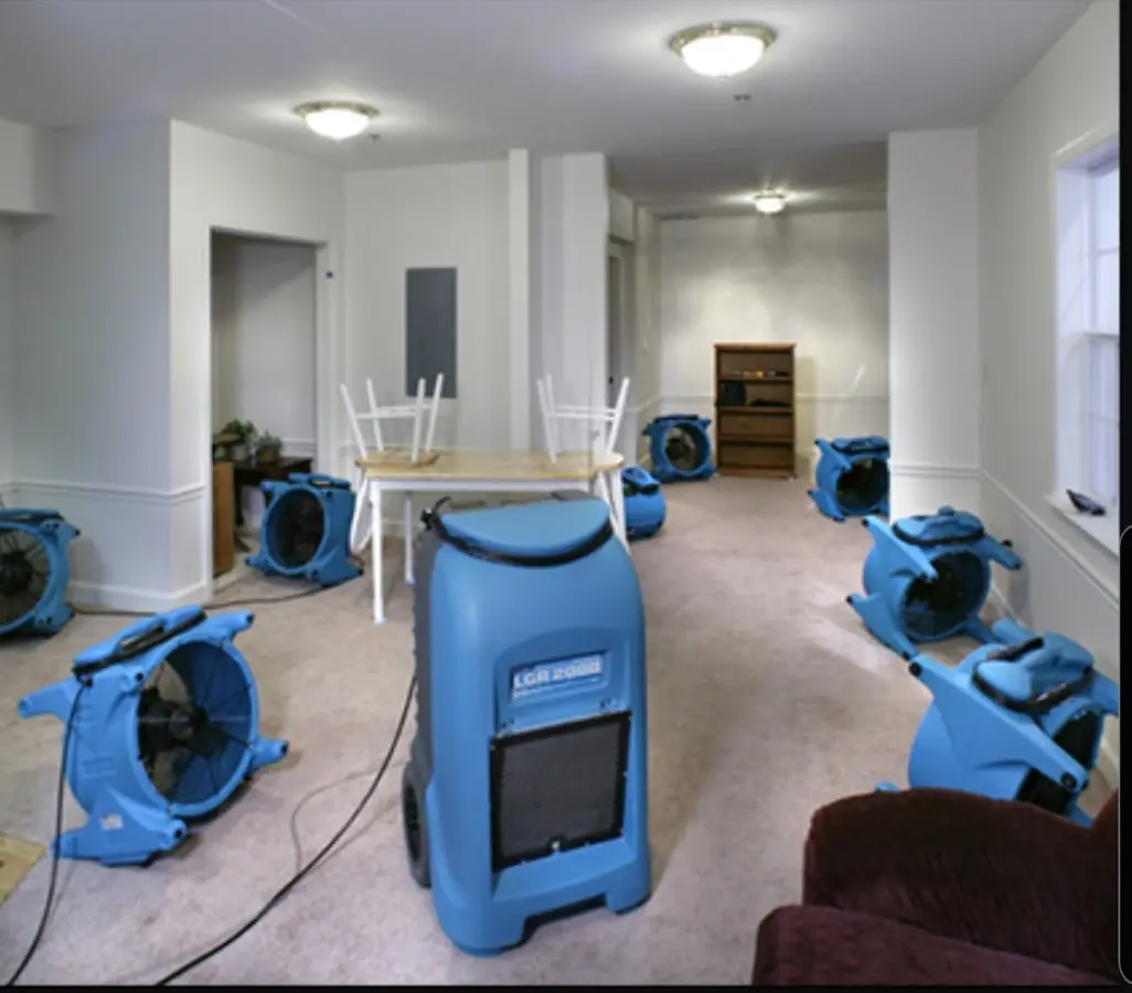 Air movers and dehumidifier setup for Water Damage Restoration in Hooksett